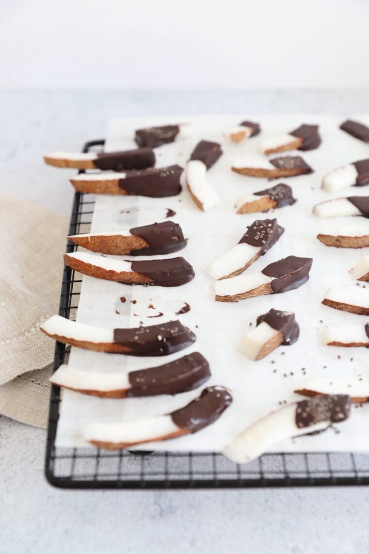 Half covered coconut strips with dark chocolate (with optional superfood addition)